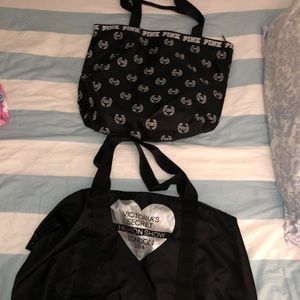 Two black Victoria’s Secret bags.
